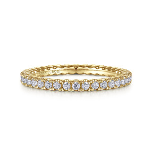 Gabriel & Co. AN15582-6Y44JJ 14 karat yellow gold Classic anniversary band, front view of round diamonds with tiny beaded prong tips and a rippled inner edge showing behind