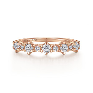 Gabriel & Co. AN15583K44JJ 14 karat rose gold Starlight anniversary band, front view of larger and smaller stones alternating between pointed prong tips
