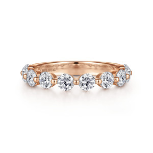 Gabriel & Co. AN15750K44JJ 14 karat rose gold Classic anniversary band, front view of separated round diamonds with small metal beads between them and a maker's mark inside
