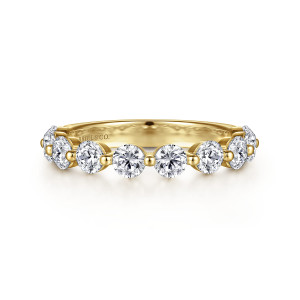 Gabriel & Co. AN15750Y44JJ 14 karat yellow gold Classic anniversary band, front view of round stones separated by small beads, with a maker's mark showing inside