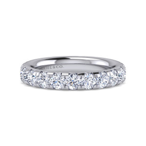 Gabriel & Co. AN15888-4W44JJ 14 karat white gold Classic eternity band, front view of round diamonds set close together with pointed prongs between them