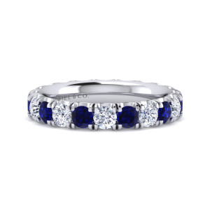 Gabriel & Co. AN15890-4W44SA 14 karat white gold Classic eternity band, front view of colorless diamonds alternating with deep blue stones between forked prongs