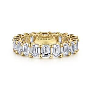 Gabriel & Co. AN16149-6Y43JJ 14 karat yellow gold Classic eternity band, front view of rectangular stones with clipped corners and round tipped prongs at each join
