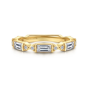 Gabriel & Co. AN16165Y44JJ 14 karat yellow gold Art Deco anniversary band, front view of a lengthwise baguette between pairs of small round diamonds in angular spacers