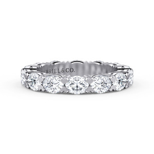 Gabriel & Co. AN16298-4W44JJ 14 karat white gold Contemporary eternity band, front view of elongated stones laid lengthwise between small heart-shaped prong tips