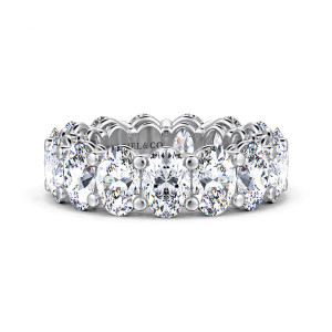 Gabriel & Co. AN16380-4W44JJ 14 karat white gold Contemporary eternity band, front view of large elongated diamonds set crosswise, with bead tipped prongs between them
