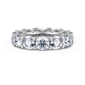 Gabriel & Co. AN16390-4W44JJ 14 karat white gold Classic eternity band, front view of large round stones with small round tipped prongs at each joint