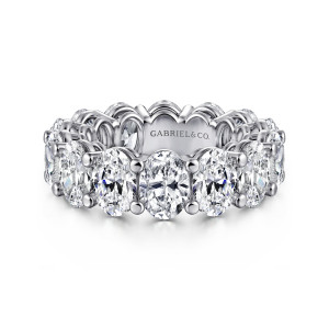 Gabriel & Co. AN16395-4W44JJ 14 karat white gold Contemporary eternity band, front view of elongated stones lying crosswise with beaded prong tips and a scalloped inner rim