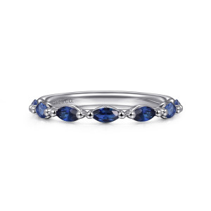 Gabriel & Co. AN16425W4JSA 14 karat white gold Contemporary anniversary band, front view of blue marquise stones set end to end with round metal beads between