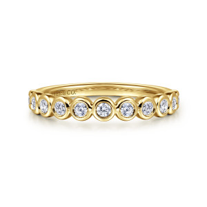 Gabriel & Co. AN16456Y44JJ 14 karat yellow gold Contemporary anniversary band, front view of round diamonds in touching rims with a plain polished shank behind them