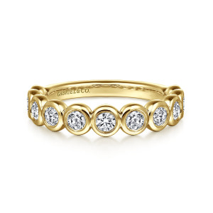 Gabriel & Co. AN16457Y44JJ 14 karat yellow gold Contemporary anniversary band, front view of round stones in touching smooth rims across the top of the hoop