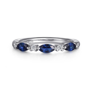 Gabriel & Co. AN16474W44SA 14 karat white gold Classic anniversary band, front view of blue pointed oval stones alternating with small round diamonds on a straight band