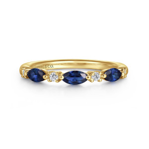 Gabriel & Co. AN16474Y44SA 14 karat yellow gold Classic anniversary band, front view of blue marquise stones pointing along the band with a small round diamond between each