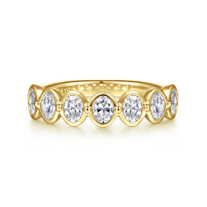Gabriel & Co. AN16645Y44JJ 14 karat yellow gold Contemporary anniversary band, front view of elongated stones in smooth rims with a small bead at each join