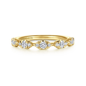 Gabriel & Co. AN16654Y44JJ 14 karat yellow gold Contemporary anniversary band, front view of leaf shaped stations, each with a larger round stone between two tiny ones