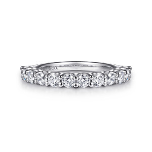 Gabriel & Co. AN16748W44JJ 14 karat white gold Contemporary wedding band, front view of round diamonds between shared prongs along a straight smooth band