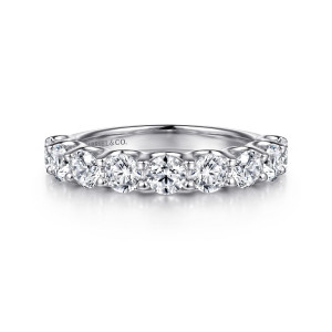 Gabriel & Co. AN16750W44JJ 14 karat white gold Contemporary wedding band, front view of a single line of round stones in shared ball tipped prongs across the top