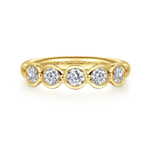 Gabriel & Co. AN16782Y44JJ 14 karat yellow gold Contemporary anniversary band, front view of five round stones in separate bezels joined by tiny beads of metal