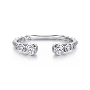 Gabriel & Co. AN16792W44JJ 14 karat white gold Contemporary anniversary band, front view of the open gap between two matching trios of round diamonds in bezels