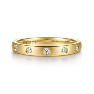 Gabriel & Co. AN16793Y44JJ 14 karat yellow gold Contemporary anniversary band, front view of small round stones sunk flush into a brushed flat surface with plain metal between