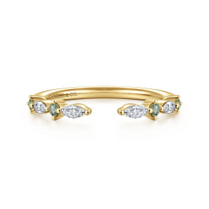 Gabriel & Co. AN16804Y43GS 14 karat yellow gold Contemporary anniversary band, front view of an open band with marquise stones and small round green stones at both ends