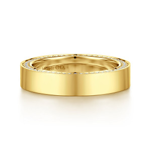 Gabriel & Co. AN16861-6Y44JJ 14 karat yellow gold Contemporary eternity band, front view of the plain polished outer face with stones glinting along the far edge