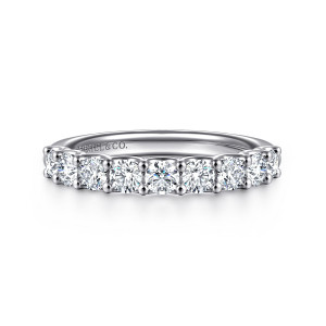 Gabriel & Co. AN17067W44JJ 14 karat white gold Contemporary wedding band, front view of round diamonds separated by paired round prong tips on each edge