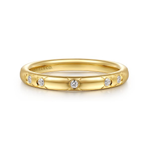Gabriel & Co. AN17069Y44JJ 14 karat yellow gold Victorian anniversary band, front view of a domed polished band with round diamonds set apart in small collars