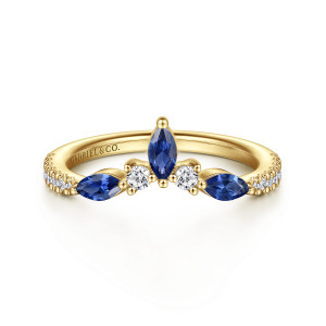 Gabriel & Co. AN17081Y44SA 14 karat yellow gold Kaslique anniversary band, front view of the peaked crown with three blue marquise stones and two round diamonds