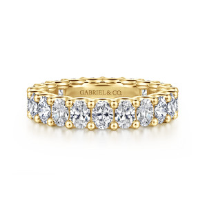 Gabriel & Co. AN17148-6Y44JJ 14 karat yellow gold Contemporary eternity band, front view of elongated diamonds set crosswise with rounded prong tips along both edges