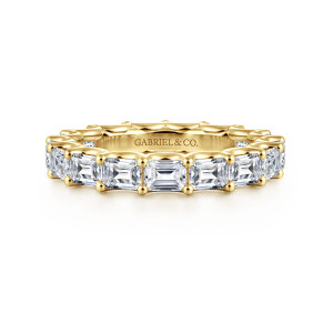 Gabriel & Co. AN17152-6Y43JJ 14 karat yellow gold Contemporary eternity band, front view of rectangular step-cut stones lying crosswise with a maker's mark inside