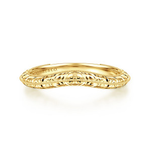 Gabriel & Co. AN17159Y4JJJ 14 karat yellow gold Victorian anniversary band, front view of a shallow dip along the top edge and a carved leaf pattern between milgrain borders