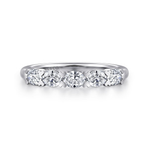 Gabriel & Co. AN17183W44JJ 14 karat white gold Contemporary anniversary band, front view of elongated stones lying sideways between small flared metal tips