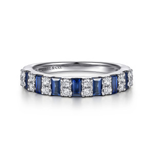 Gabriel & Co. AN17197W44SA 14 karat white gold Contemporary anniversary band, front view of crosswise blue baguettes alternating with paired round diamonds