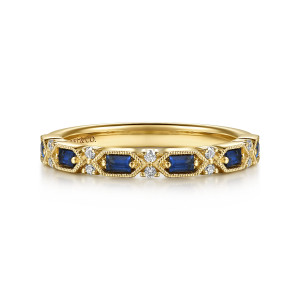 Gabriel & Co. AN17218Y44SA 14 karat yellow gold Victorian anniversary band, front view of blue baguette stones in pointed frames with tiny diamond pairs between
