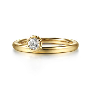 Gabriel & Co. AN17222Y44JJ 14 karat yellow gold Contemporary ring enhancer, front view of a smooth hoop with a bezel diamond sitting at its open end