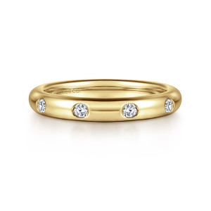Gabriel & Co. AN6030-4Y44JJ 14 karat yellow gold Contemporary eternity band, front view of spaced round diamonds flush set in a smooth domed polished surface