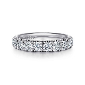 Gabriel & Co. AN6070PT4JJ platinum Classic wedding band, front view of round diamonds divided by tall prongs along the top of the band