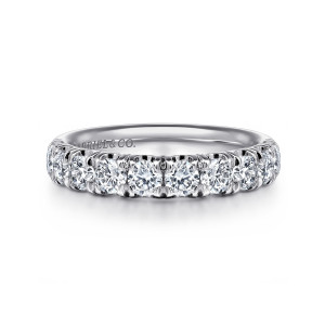 Gabriel & Co. AN6070W44JJ 14 karat white gold Classic wedding band, front view of round diamonds in a high row with pointed prong tips between them