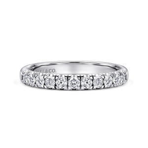 Gabriel & Co. AN6072W44JJ 14 karat white gold Classic wedding band, front view of a straight band with round diamonds sitting between shared prongs