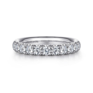 Gabriel & Co. AN6073W44JJ 14 karat white gold Classic wedding band, front view of round stones sharing split prongs in a single line above a plain polished edge