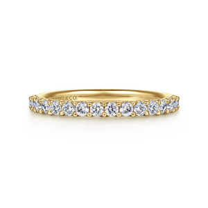 Gabriel & Co. AN7603Y44JJ 14 karat yellow gold Classic wedding band, front view of the straight band with prongs standing clear of the polished metal