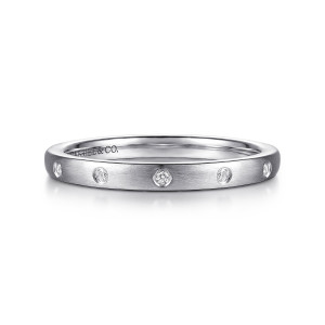 Gabriel & Co. AN7865W44JJ 14 karat white gold Contemporary anniversary band, front view of small round stones in thin rims spaced along a brushed straight face