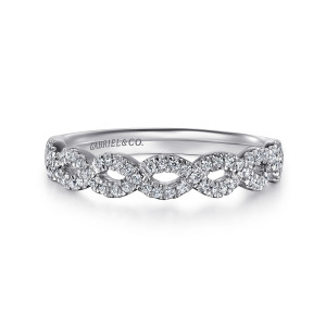 Gabriel & Co. AN8261PT4JJ platinum Contemporary anniversary band, front view of crossing stone strands with almond shaped openings between the twists