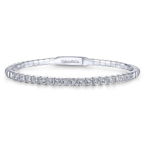 Gabriel & Co. BG3845-62W45JJ 14 karat white gold Lusso bangle, front view of the row of single diamonds above the flat maker's mark plate