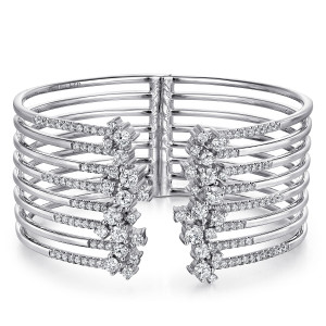 Gabriel & Co. BG4199-65W84JJ 18 karat white gold Waterfall bangle, front view of the gap with a cascade of larger diamonds and stepped pave runs on both ends