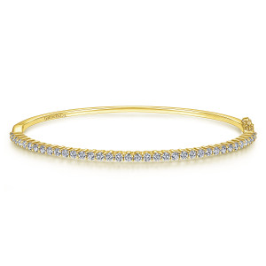 Gabriel & Co. BG4210-65Y45JJ 14 karat yellow gold Lusso bangle, front view of the hinged bangle with a line of diamonds and a smooth band behind