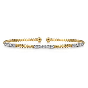 Gabriel & Co. BG4217-62Y45JJ 14 karat yellow gold Bujukan bangle, front view of three diamond bars spaced between polished metal beads