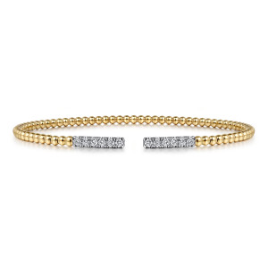Gabriel & Co. BG4218-62Y45JJ 14 karat yellow gold Bujukan bangle, front view of both stone set end bars facing across the gap in the bead band