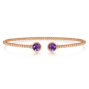 Gabriel & Co. BG4252-57K4JAM 14 karat rose gold Bujukan bangle, front view of the two round purple stones in bezels facing each other at the gap